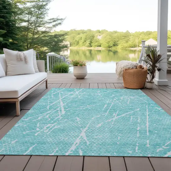 Teal Blue And Ivory Abstract Washable Indoor Outdoor Area Rug Photo 8