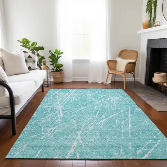 Teal Blue And Ivory Abstract Washable Indoor Outdoor Area Rug Photo 7
