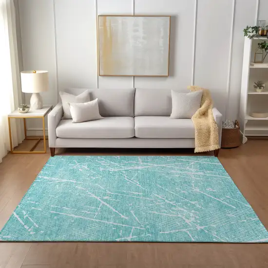 Teal Blue And Ivory Abstract Washable Indoor Outdoor Area Rug Photo 5