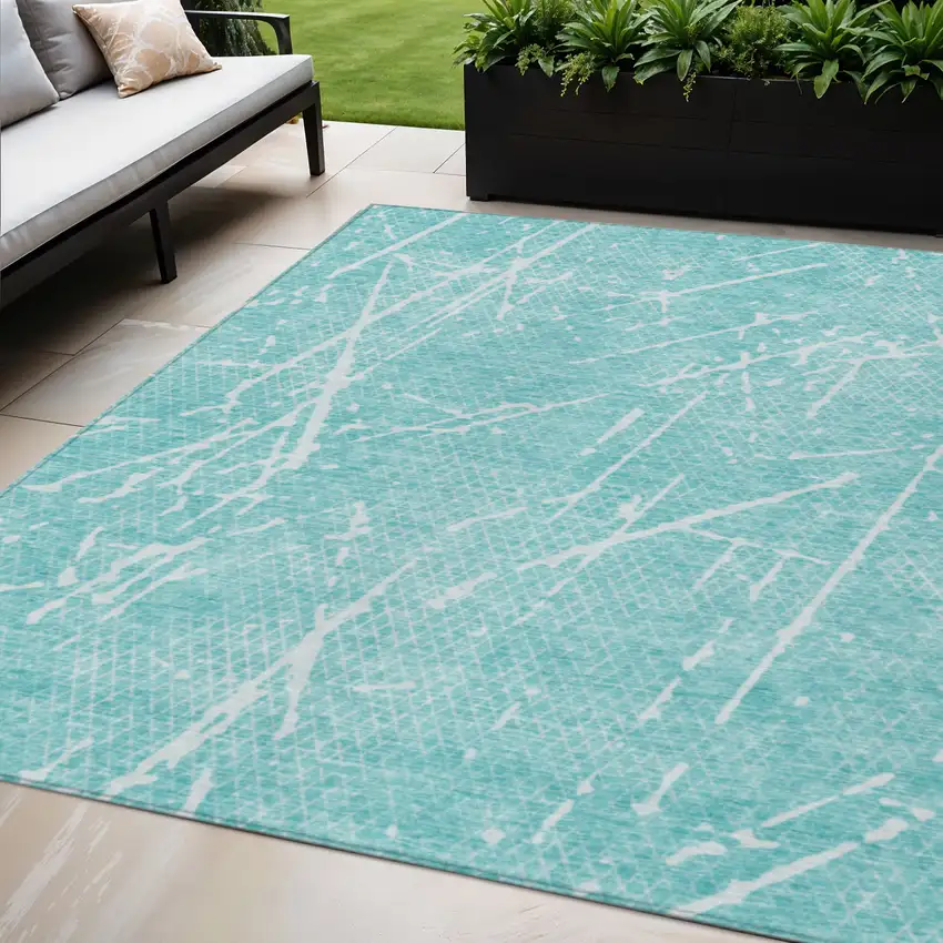 Teal Blue And Ivory Abstract Washable Indoor Outdoor Area Rug Photo 1