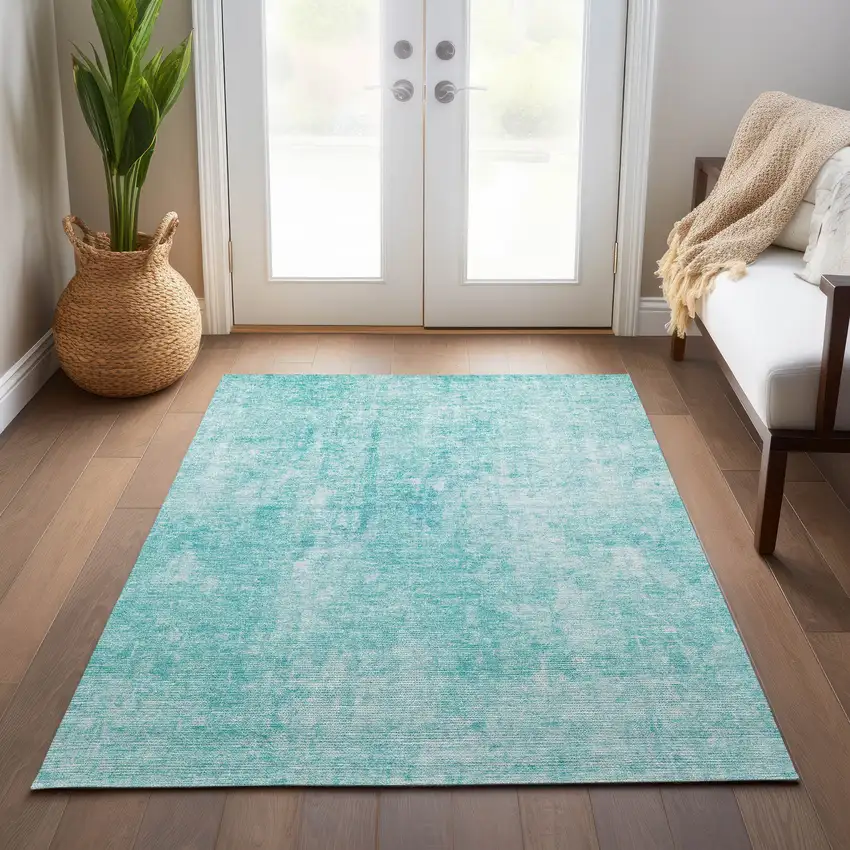 Teal Blue And Ivory Abstract Washable Indoor Outdoor Area Rug Photo 9
