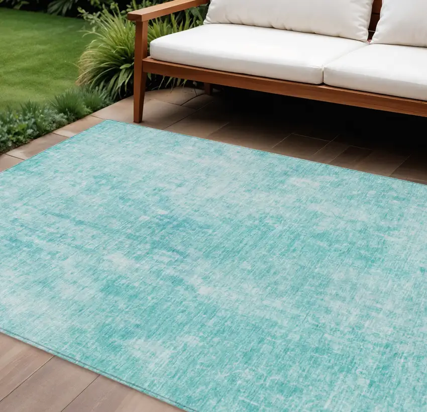 Teal Blue And Ivory Abstract Washable Indoor Outdoor Area Rug Photo 1