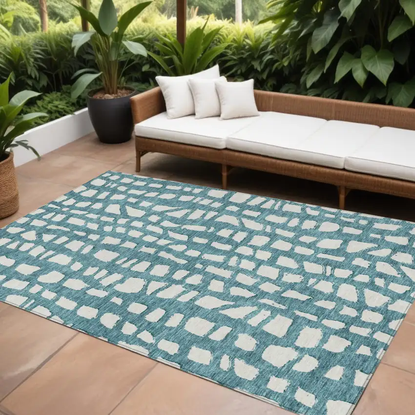 Teal Blue And Ivory Abstract Washable Indoor Outdoor Area Rug Photo 1