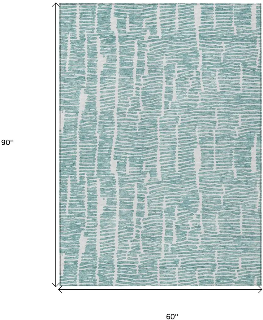 Teal Blue And Ivory Abstract Washable Indoor Outdoor Area Rug Photo 3