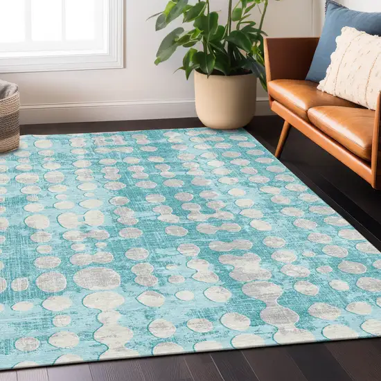 Teal Blue And Ivory Abstract Washable Indoor Outdoor Area Rug Photo 9