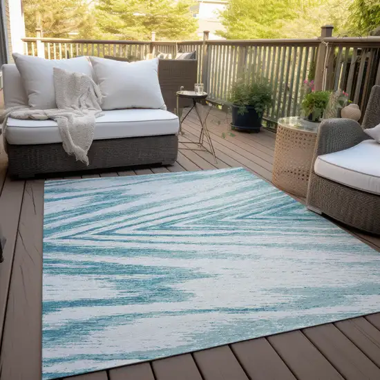 Teal Blue And Ivory Abstract Washable Indoor Outdoor Area Rug Photo 9
