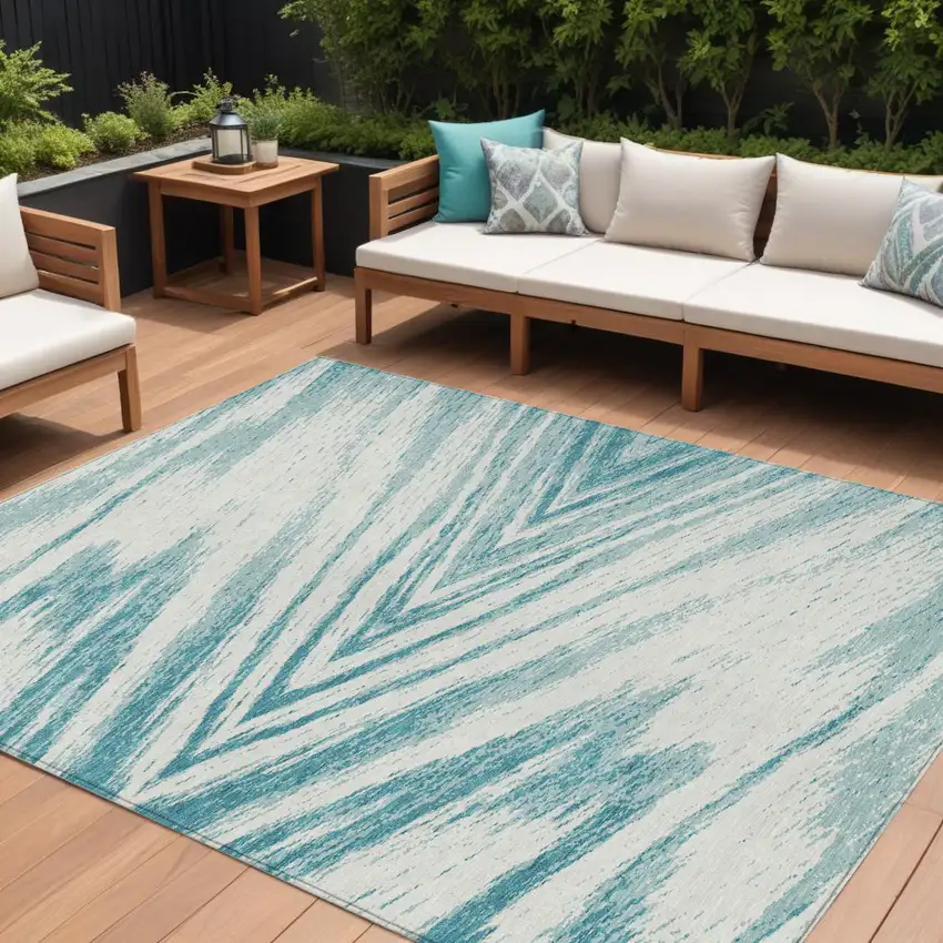 Teal Blue And Ivory Abstract Washable Indoor Outdoor Area Rug Photo 1