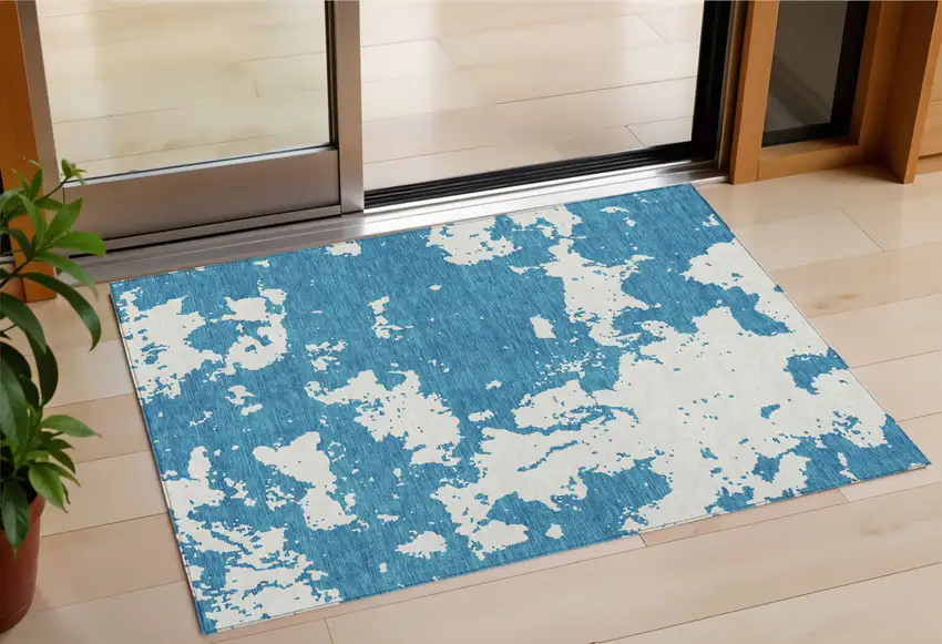Teal Blue And Ivory Abstract Washable Indoor Outdoor Area Rug Photo 1