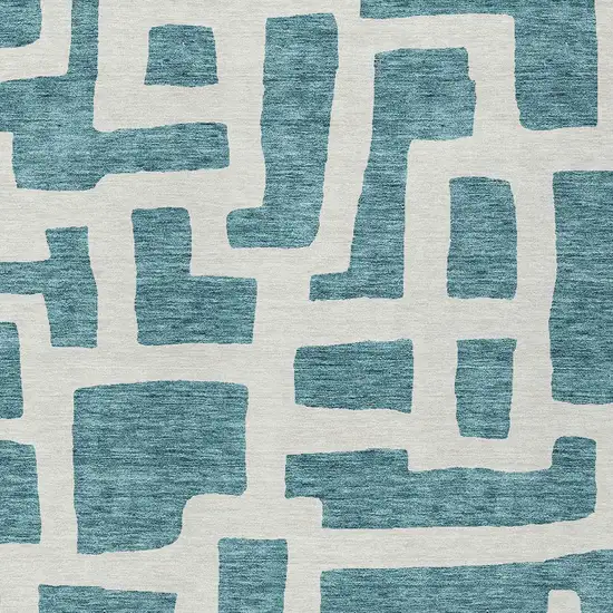 Teal Blue And Ivory Abstract Washable Indoor Outdoor Area Rug Photo 6