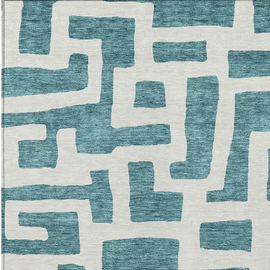 Teal Blue And Ivory Abstract Washable Indoor Outdoor Area Rug Photo 6