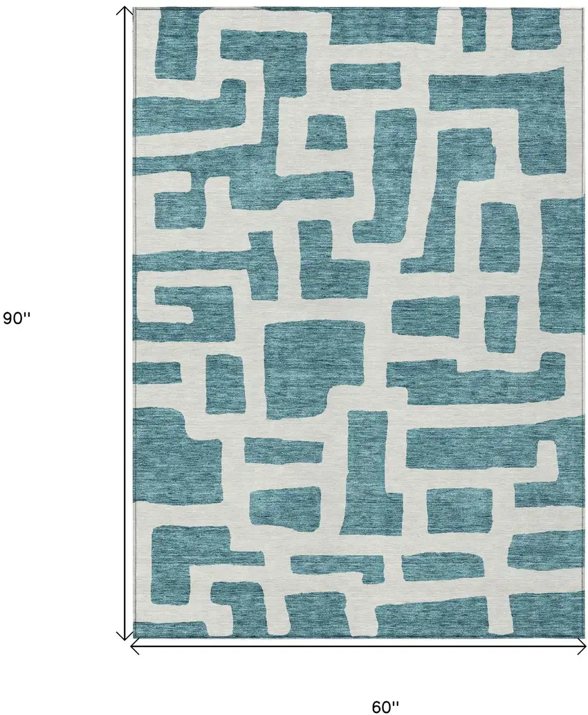 Teal Blue And Ivory Abstract Washable Indoor Outdoor Area Rug Photo 3
