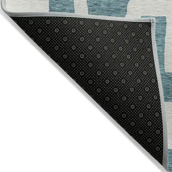 Teal Blue And Ivory Abstract Washable Indoor Outdoor Area Rug Photo 4