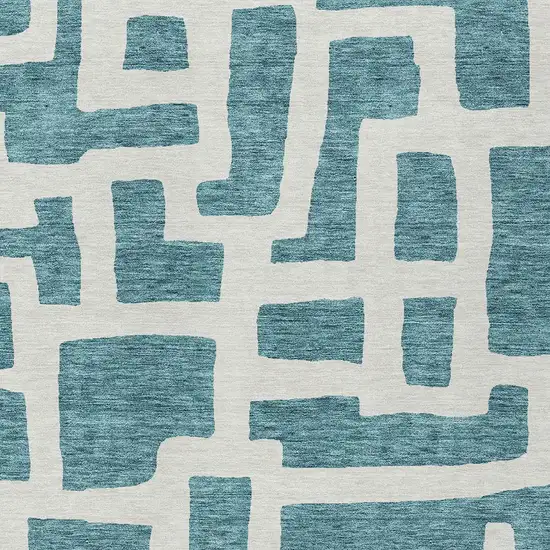 Teal Blue And Ivory Abstract Washable Indoor Outdoor Area Rug Photo 6