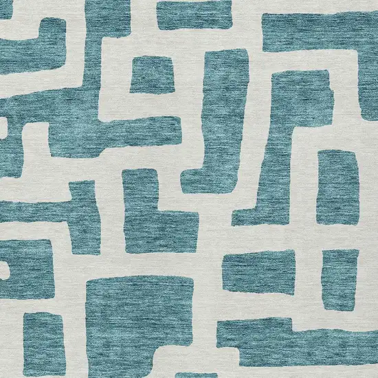 Teal Blue And Ivory Abstract Washable Indoor Outdoor Area Rug Photo 6
