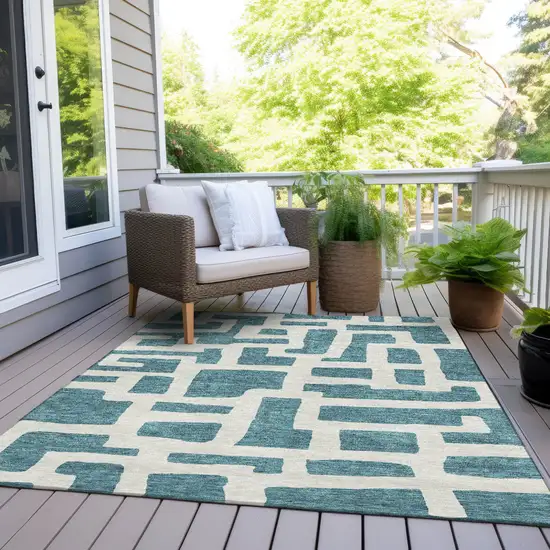 Teal Blue And Ivory Abstract Washable Indoor Outdoor Area Rug Photo 6
