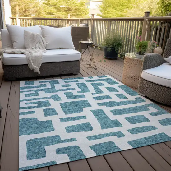 Teal Blue And Ivory Abstract Washable Indoor Outdoor Area Rug Photo 9