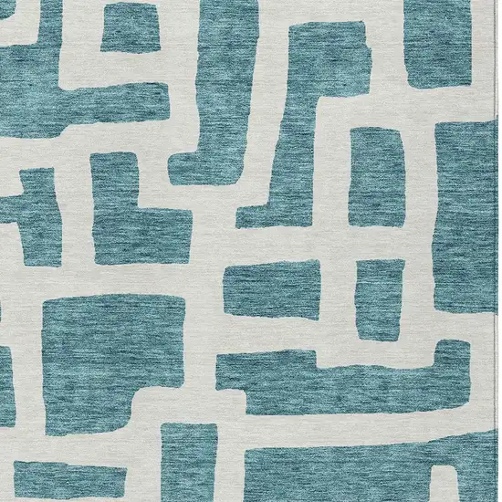 Teal Blue And Ivory Abstract Washable Indoor Outdoor Area Rug Photo 4