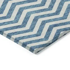 Photo of Teal Blue And Ivory Chevron Washable Indoor Outdoor Area Rug