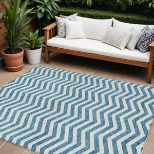 Photo of Teal Blue And Ivory Chevron Washable Indoor Outdoor Area Rug