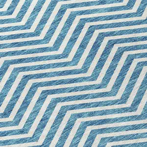 Photo of Teal Blue And Ivory Chevron Washable Indoor Outdoor Area Rug
