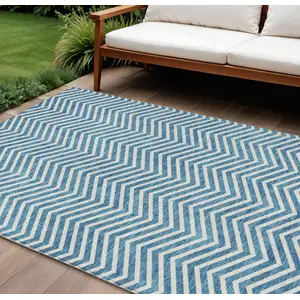 Photo of Teal Blue And Ivory Chevron Washable Indoor Outdoor Area Rug