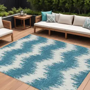 Photo of Teal Blue And Ivory Chevron Washable Indoor Outdoor Area Rug