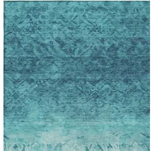 Photo of Teal Blue And Ivory Damask Washable Indoor Outdoor Area Rug