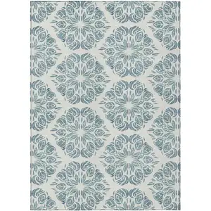 Photo of Teal Blue And Ivory Damask Washable Indoor Outdoor Area Rug
