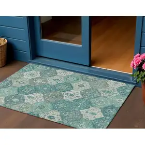 Photo of Teal Blue And Ivory Floral Medallion Washable Indoor Outdoor Area Rug