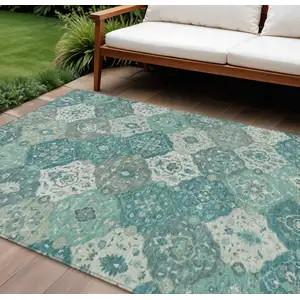Photo of Teal Blue And Ivory Floral Medallion Washable Indoor Outdoor Area Rug