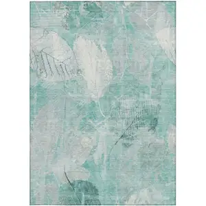 Photo of Teal Blue And Ivory Floral Washable Indoor Outdoor Area Rug