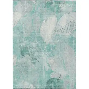 Photo of Teal Blue And Ivory Floral Washable Indoor Outdoor Area Rug