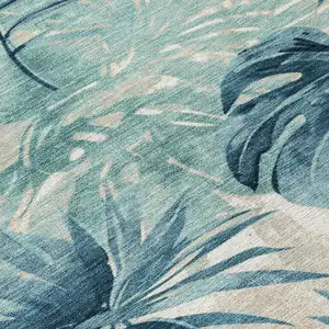 Photo of Teal Blue And Ivory Floral Washable Indoor Outdoor Area Rug