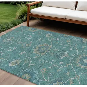 Photo of Teal Blue And Ivory Floral Washable Indoor Outdoor Area Rug