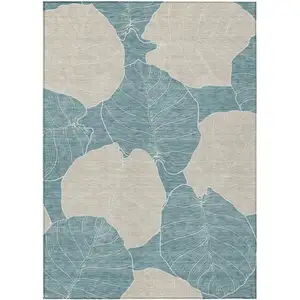Photo of Teal Blue And Ivory Floral Washable Indoor Outdoor Area Rug