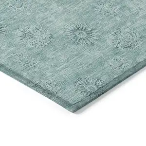 Photo of Teal Blue And Ivory Floral Washable Indoor Outdoor Area Rug