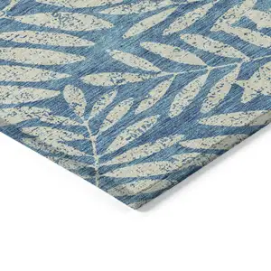 Photo of Teal Blue And Ivory Floral Washable Indoor Outdoor Area Rug