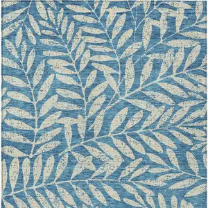 Photo of Teal Blue And Ivory Floral Washable Indoor Outdoor Area Rug