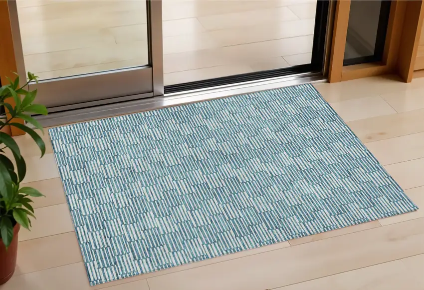 Teal Blue And Ivory Geometric Washable Indoor Outdoor Area Rug Photo 1