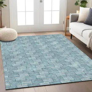 Photo of Teal Blue And Ivory Geometric Washable Indoor Outdoor Area Rug