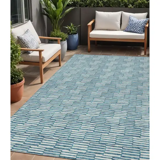 Teal Blue And Ivory Geometric Washable Indoor Outdoor Area Rug Photo 1