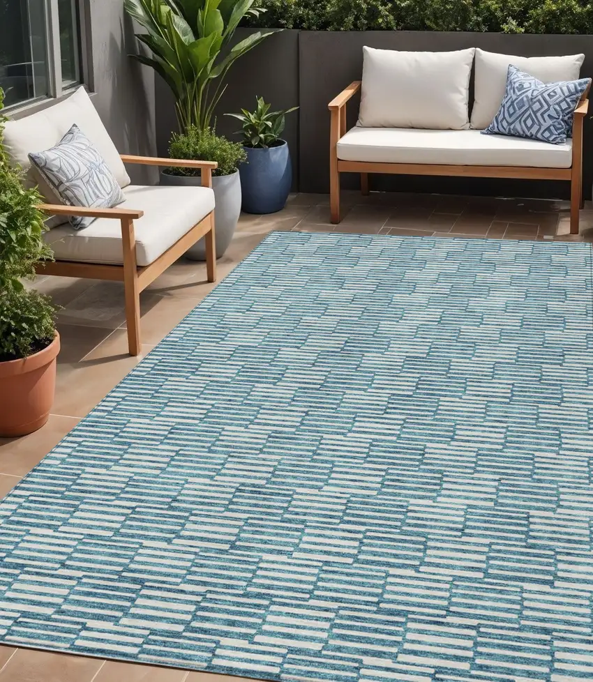 Teal Blue And Ivory Geometric Washable Indoor Outdoor Area Rug Photo 1