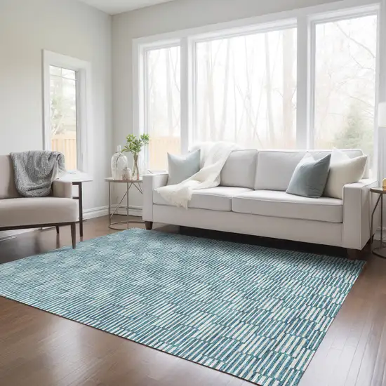 Teal Blue And Ivory Geometric Washable Indoor Outdoor Area Rug Photo 9