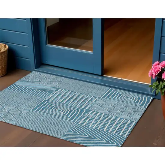Teal Blue And Ivory Geometric Washable Indoor Outdoor Area Rug Photo 1