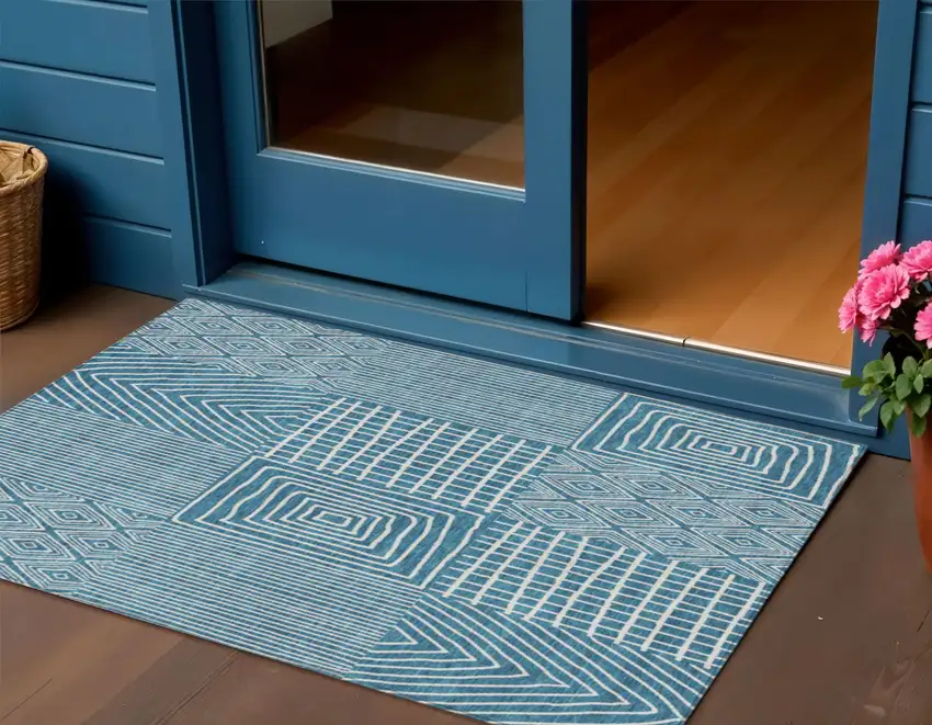 Teal Blue And Ivory Geometric Washable Indoor Outdoor Area Rug Photo 1