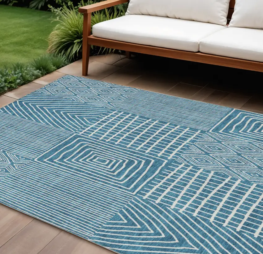 Teal Blue And Ivory Geometric Washable Indoor Outdoor Area Rug Photo 1