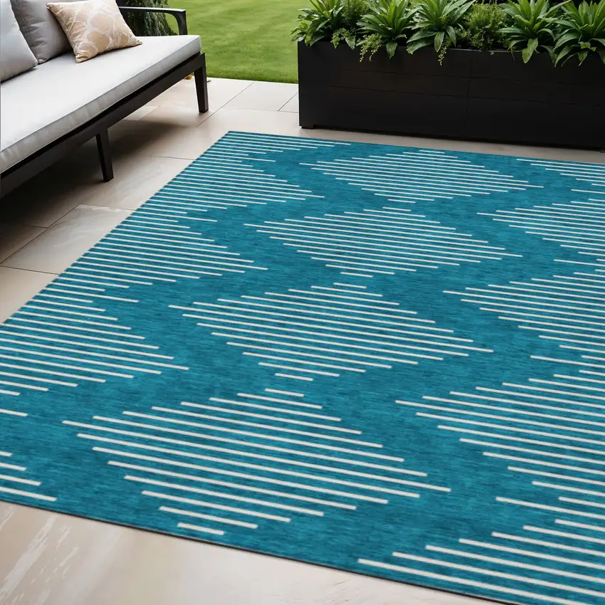 Teal Blue And Ivory Geometric Washable Indoor Outdoor Area Rug Photo 1
