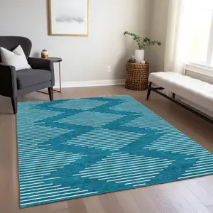 Photo of Teal Blue And Ivory Geometric Washable Indoor Outdoor Area Rug