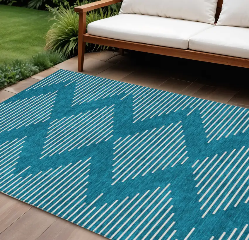 Teal Blue And Ivory Geometric Washable Indoor Outdoor Area Rug Photo 1