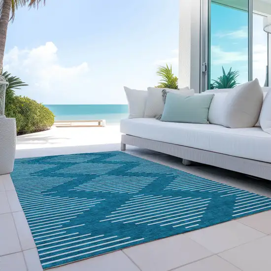 Teal Blue And Ivory Geometric Washable Indoor Outdoor Area Rug Photo 9